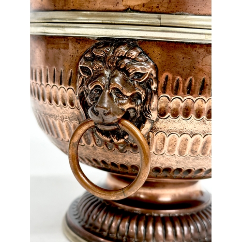 30 - A good quality Late 19th Century copper monteith bowl. With removable crown and lion mask ring handl... 