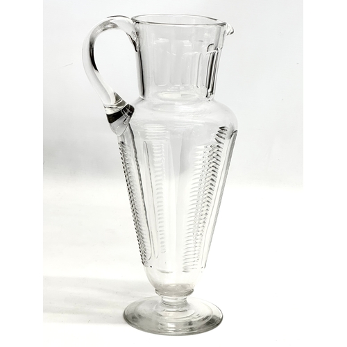 99 - A large Late 19th/Early 20th Century champagne jug. Circa 1900. 32cm