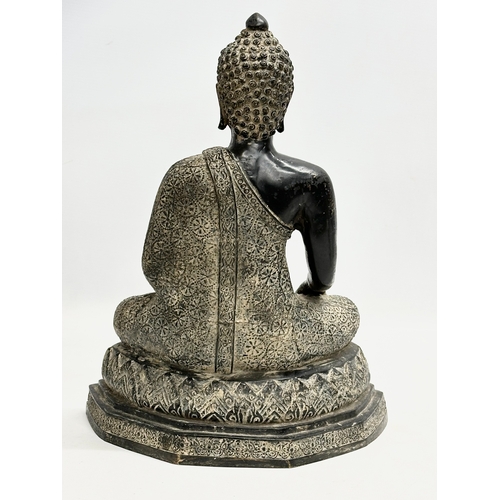 100 - A large 19th Century bronze seated Amitayus statue. 27x16x35cm.