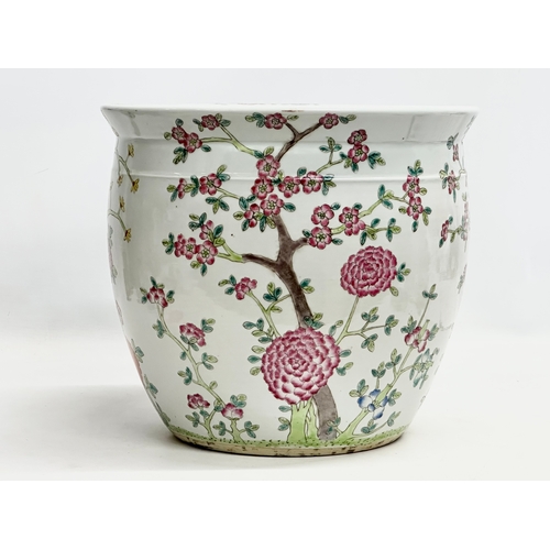 103 - A Late 19th Century Chinese Famille Rose jardiniere/planter. 31x27cm.