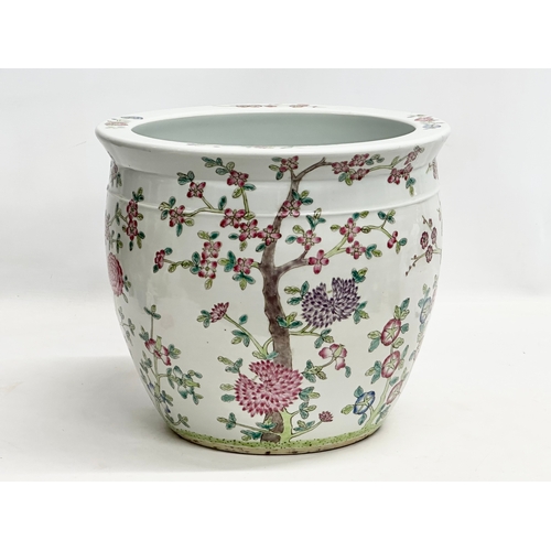 103 - A Late 19th Century Chinese Famille Rose jardiniere/planter. 31x27cm.