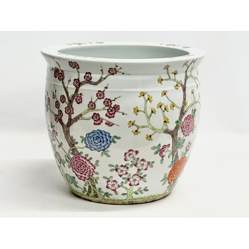 103 - A Late 19th Century Chinese Famille Rose jardiniere/planter. 31x27cm.