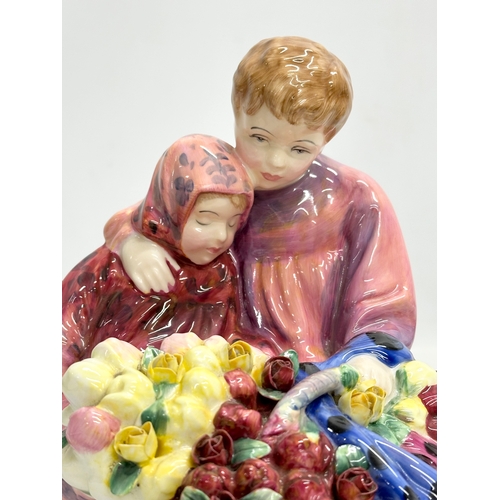 442 - A Royal Doulton ‘Flower Sellers Children’ 19x15x21cm.