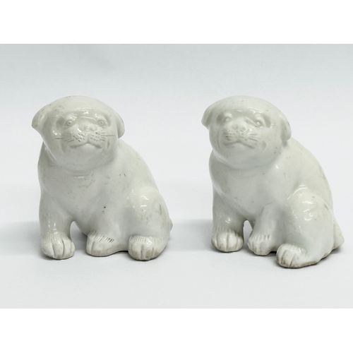 12 - A set of 3 Japanese Hirado Porcelain model puppies. Meiji Period (1868-1912) Late 19th Century.