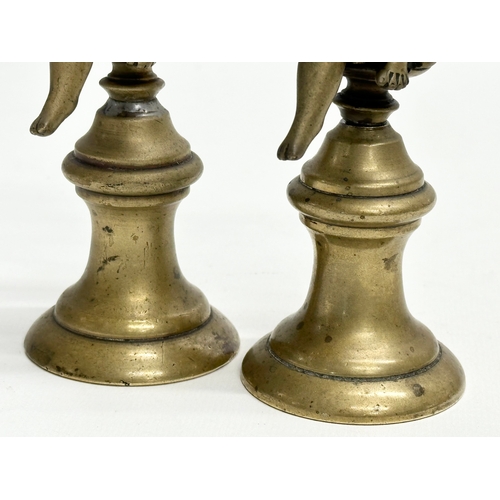 190 - A pair of Late 19th Century heavy brass cherubs. 14cm