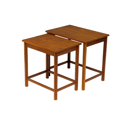 809 - A Danish Mid Century teak nest of tables. Designed by Hans C. Andersen. 2