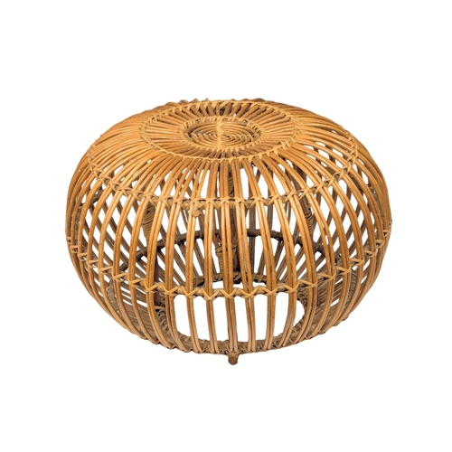 811 - An Italian Mid Century rattan footstool designed by Franco Albini. 60x37cm (1)