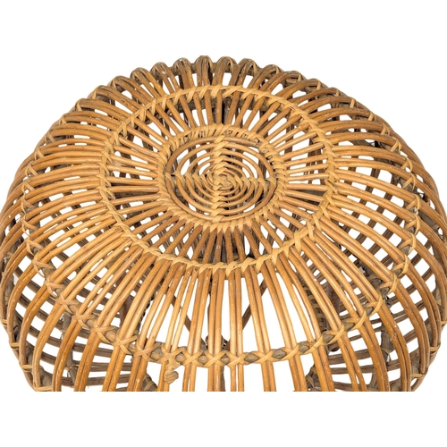 811 - An Italian Mid Century rattan footstool designed by Franco Albini. 60x37cm (1)