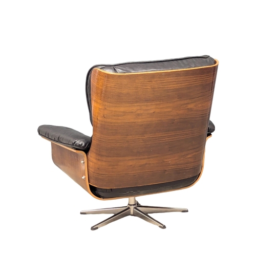 816 - A Charles and Ray Eames style swivel armchair (1)