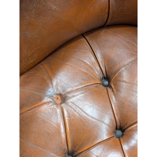 818 - A William IV style mahogany deep button gents armchair (1)