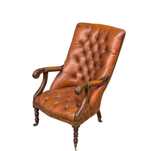 818 - A William IV style mahogany deep button gents armchair (1)