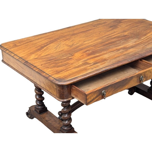 819 - A large Early Victorian mahogany library table with Barley Twist supports raised on Cabriole legs. 1... 