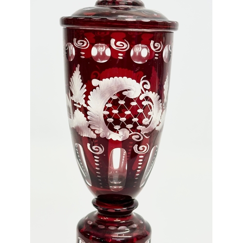 116 - Friedrich Egermann. An Early 20th Century Bohemian ruby glass jar urn with cover. By Egermann. 27cm