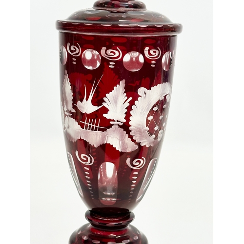 116 - Friedrich Egermann. An Early 20th Century Bohemian ruby glass jar urn with cover. By Egermann. 27cm