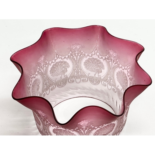 194 - A Victorian etched cranberry glass shade. 19.5x12cm.