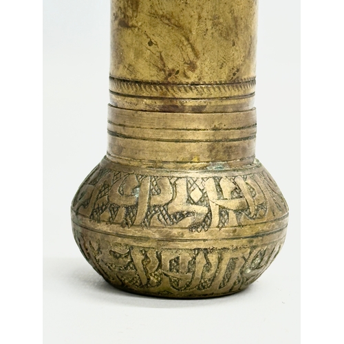 201 - A Late 19th Century brass spice grinder. 11cm.