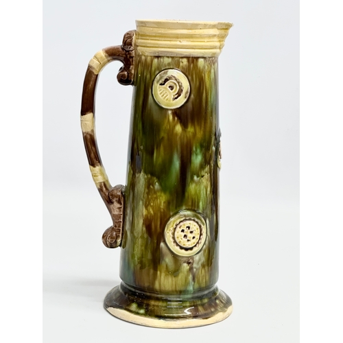 203 - A large Late 19th Century Majolica pitcher. 30cm.