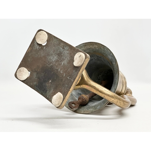 107 - A Late 19th Century bronze ships bell. 22x37cm