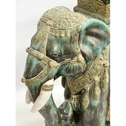 176 - An Early 20th Century glazed stoneware elephant garden stool.  55x55cm