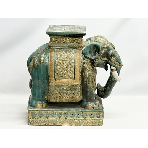 176 - An Early 20th Century glazed stoneware elephant garden stool.  55x55cm