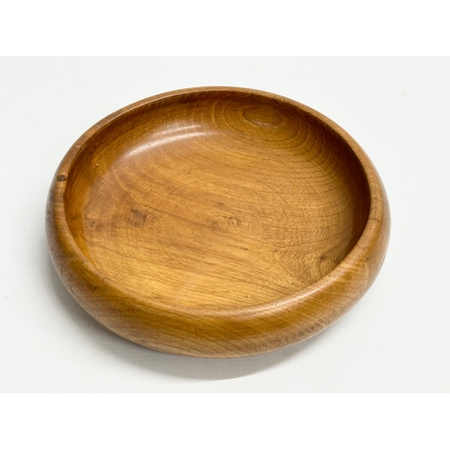 208 - A Mid Century teak bowl. 23x7cm