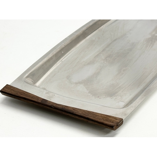 207 - A Danish Mid Century serving tray by Scandi. 50x22cm