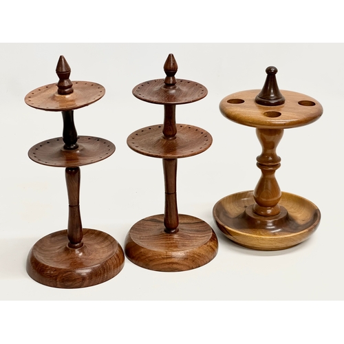 209 - 3 turned wooden stands. A pair of 2 tier Indian rosewood earring stands/pin stands. A turned yew woo... 