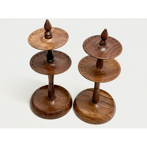 209 - 3 turned wooden stands. A pair of 2 tier Indian rosewood earring stands/pin stands. A turned yew woo... 