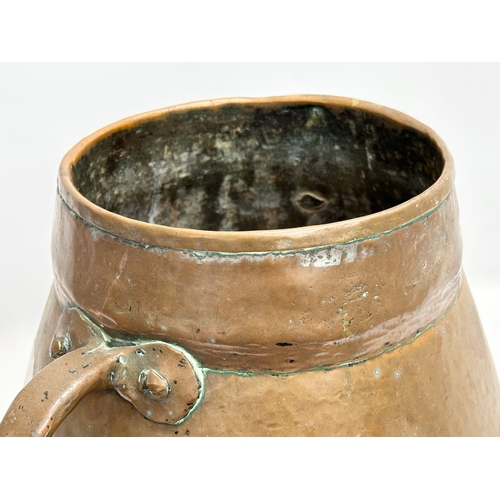 75 - A Late 19th Century French copper 2 handled pot. 40x35x34cm.