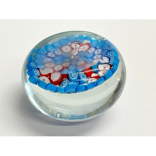 37 - A large Late 19th Century millefiori glass paperweight. 9x6.5cm