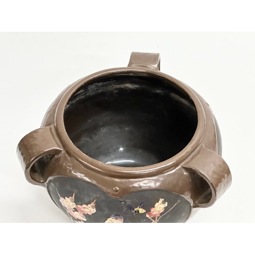 232 - An Early 20th Century Arts & Crafts 3 handled jardiniere by Bretby. Circa 1900-1910. 27x26x17cm.