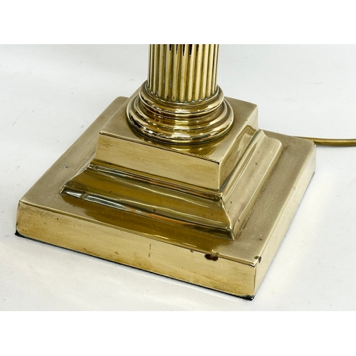 230 - A large vintage brass table lamp with Corinthian style column. 57x74cm