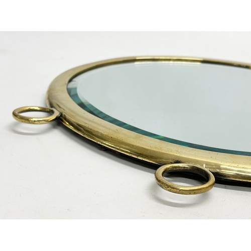 178 - A Late 19th/Early 20th Century brass framed tray/mirror, with bevelled glass. 33x35cm