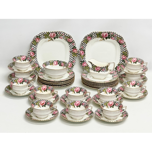 250 - A 40 piece 1930’s Aynsley tea service.