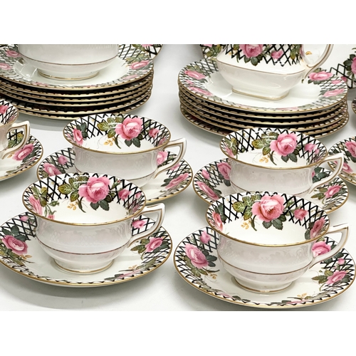 250 - A 40 piece 1930’s Aynsley tea service.