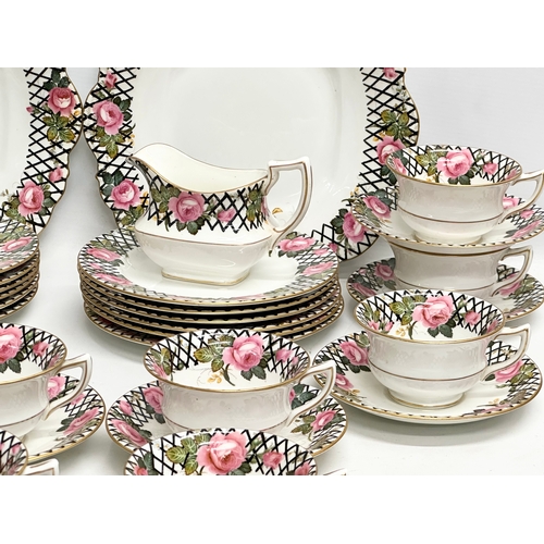 250 - A 40 piece 1930’s Aynsley tea service.