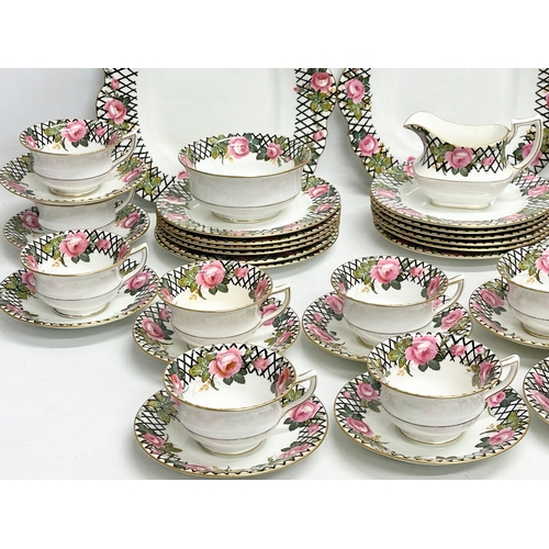 250 - A 40 piece 1930’s Aynsley tea service.