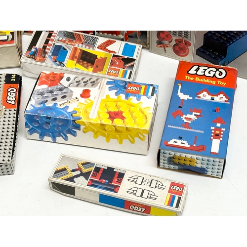 420 - A collection of vintage LEGO in boxes.