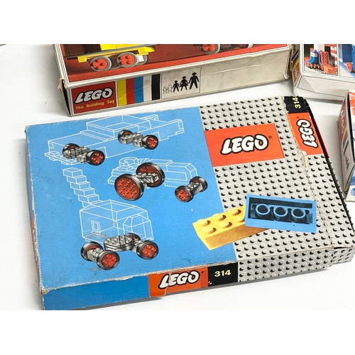 420 - A collection of vintage LEGO in boxes.