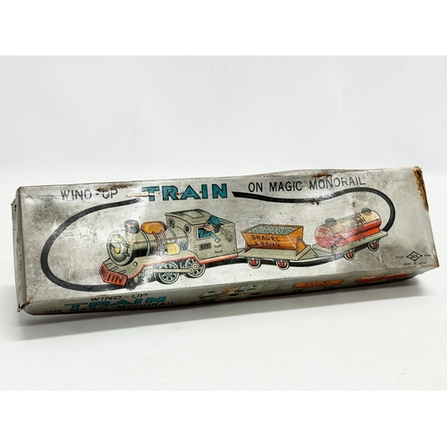 422 - A vintage Daiya Windup Train On Magic Monorail in original box.