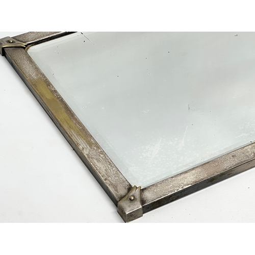 267 - An Early 20th Century plated brass framed mirror. Circa 1900-1910. 66x46cm.