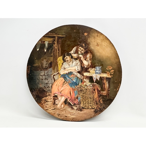 334 - A 19th Century oil painting wall plaque. 36.5cm