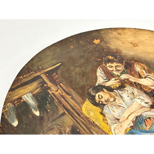 334 - A 19th Century oil painting wall plaque. 36.5cm