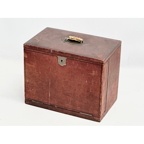 270 - A Late 19th/Early 20th Century leather bound fall front stationary box. Circa 1890-1910. 30x19x25cm ... 