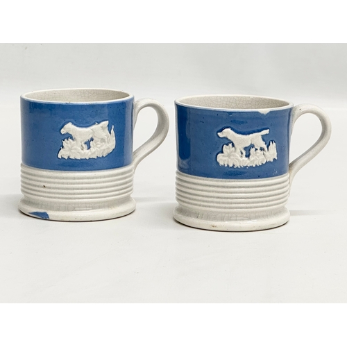 366 - A collection of 19th Century pottery and a 20th Century cream jug. A pair of Mid 19th Century mugs, ... 