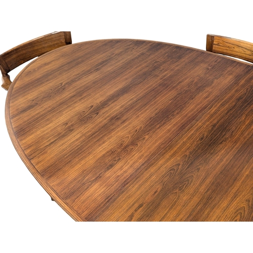 805 - A excellent quality Danish Henry Rosengren Hansen Mid Century rosewood extending dining table with 8... 