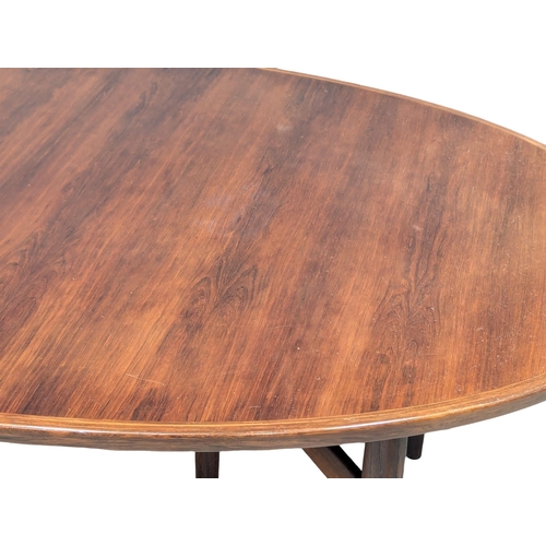 805 - A excellent quality Danish Henry Rosengren Hansen Mid Century rosewood extending dining table with 8... 