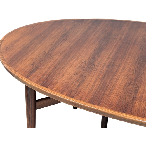 805 - A excellent quality Danish Henry Rosengren Hansen Mid Century rosewood extending dining table with 8... 