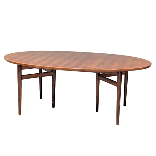 805 - A excellent quality Danish Henry Rosengren Hansen Mid Century rosewood extending dining table with 8... 