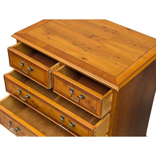 813 - A pair of Georgian style inlaid yew wood chest of drawers on bracket feet. 62.5x41.5x76cm. 3